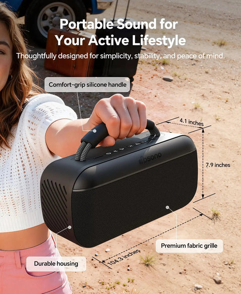 Person holding Portable Bluetooth Speaker 100W Peak Power 60W RMS SoundPulse 2.0 BassBoost Waterproof Party Speaker With True Wireless Stereo TWS Unlimited Pairing Ideal For Outdoor Indoor Beach Vacation Black with comfort-grip silicone handle and premium fabric grille.