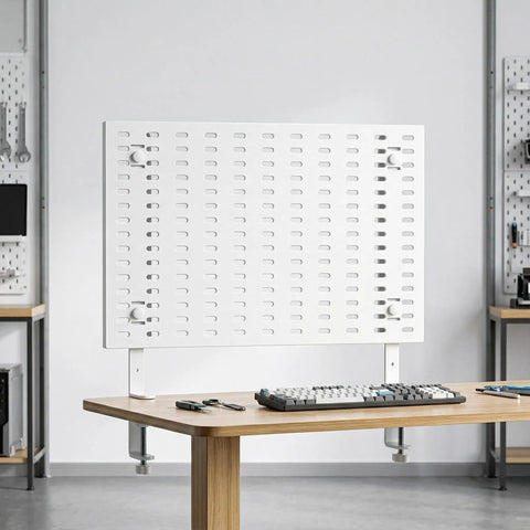 White Adjustable Iron Desk Stand Brackets Set with pegboard mounted on a wooden desk in an organized office setting