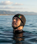 Person wearing Thermal Neoprene Hood Cap For Freediving And Sea Swimming With Adjustable Chin Strap Beanie Hat Black Large