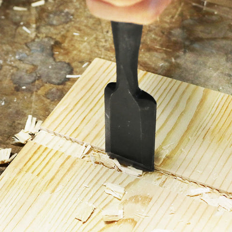 Heavy Duty Japanese Wood Chisel One Inch Hand Forged White Steel Number Two Blade cutting through wood for mortising.