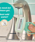 Intuition Go Disposable Razor For Sensitive Skin With BuiltIn Moisturizing Aloe Bar 4Fold Pivoting Head shown under running faucet