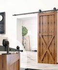 Black Rustic Non Bypass Sliding Barn Door Hardware Kit Built Tough For A Single Door 7ft Long Flat Track With T Shape Rollers shown installed on wooden door