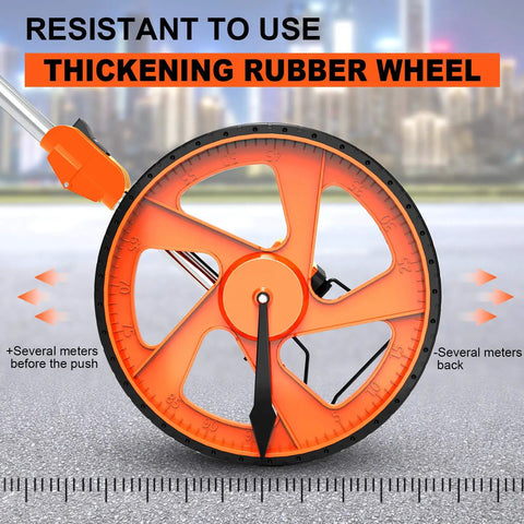 Close-up of Distance Measuring Wheel With Feet And Inches Readout, orange rubber wheel, construction background