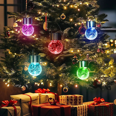 8 Pack Solar Hanging Lights Outdoor Waterproof Lanterns For Garden Decor Color Changing Cracked Glass Yard Fence And Trees Perfect Gift For Women Weatherproof And Easy To Install Lit Glow hanging on a decorated Christmas tree indoors.