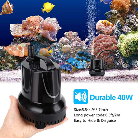 Person holding Submersible Fountain Pump 550 GPH, Quiet Outdoor Water Pump for Aquarium in front of fish tank.