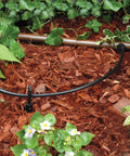 Rugged Quarter Inch Drip Irrigation Distribution Tubing 100 Foot Black Roll Easy To Unroll And Stake For Garden Beds And Landscaping Pro Grade