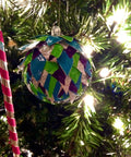 Christmas ornament made with galaxy printed duct tape roll for crafts and repairs heavy duty tape that tears by hand.
