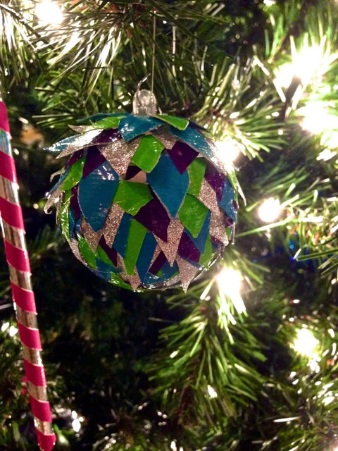 Christmas ornament made with galaxy printed duct tape roll for crafts and repairs heavy duty tape that tears by hand.