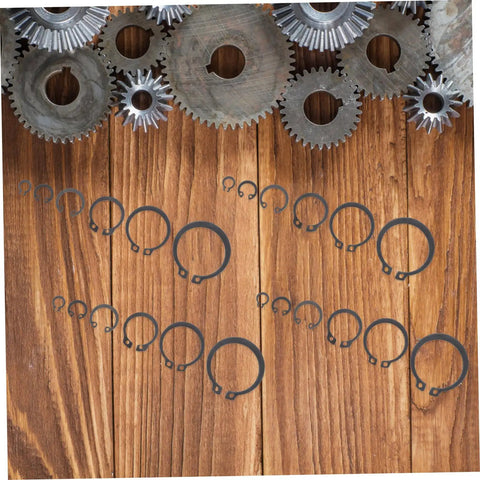 225 Piece Carbon Steel C Shaped Retaining Clip Assortment Kit External Snap Rings For Shafts And Axles displayed on wood background
