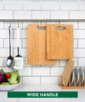 Bamboo Cutting Board Set of 3 for Kitchen hanging on rack, showcasing knife friendly food grade chopping boards.