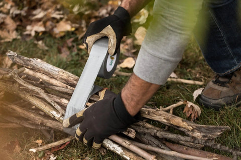 Person using Duct Tape 1.88 Inch By 10 Yard Silver All Purpose Quick Fix Tape for bundling sticks outdoors