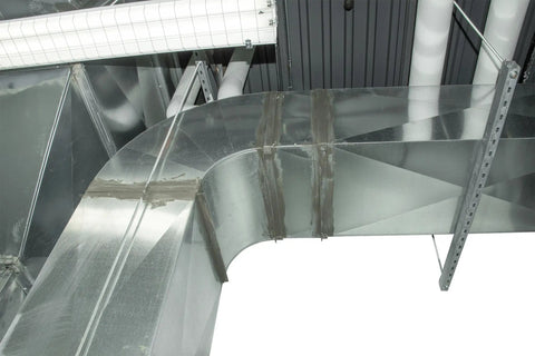 Galvanized duct with DS-530 Duct Seal 5 Lb Gray Indoor Sealant Putty for conduit openings to keep out dust, moisture, noise indoors.