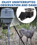 Set It Forget It Digital Auto Deer Feeder Timer Kit With Integrated Solar Panel and Precise Programming Controls Telescopic Pole Mount and Metal Spinner for Backwoods Game Attraction with deer nearby.