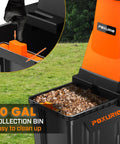 Heavy Duty 15 Amp Electric Wood Chipper Shredder With 50 Liter Bag 1.8 Inch Cutting Diameter 25 To 1 Reduction Portable Wheels For Easy Yard Cleanup Of Branches And Debris Durable Orange Finish showing collection bin