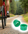 Cyclist on a trail with All-Terrain Bicycle Tire Liner Protector for Mountain and Commuter Bikes, 1mm Polyurethane Shield visible.