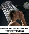 Person using 8 Setting Handheld Shower Head Set With Detachable Heads 5 Ft Stainless Steel Hose Matte Black in bathroom