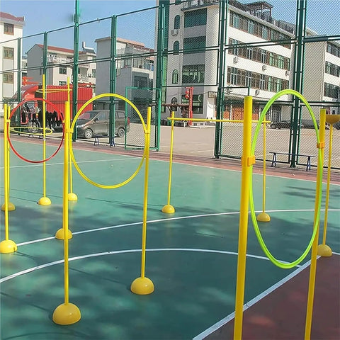 Drone Racing Obstacle Course Kit For Beginners Designed For Indoor And Outdoor Practice At Home With Adjustable Difficulty Levels And No Fuss Quick Setup For Safe Realistic Training And Endless Fun on an outdoor court.