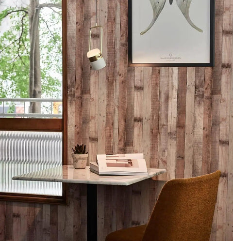 Cinnamon Wood Peel And Stick Wallpaper Self Adhesive Faux Wood Plank For Kitchen Counter And Home Decor Removable Vinyl Contact Paper 17.3 Inches By 472 Inches Roll 56.7 Sq Ft on wall behind table and chair