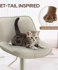 Adjustable Swivel Faux Leather Bar Stools Set Of 2, 26-34 Inch, beige stool with cat demonstrating scratch resistance.