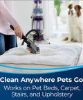 2-In-1 Pet Upholstery Tool for Carpet and Upholstery Cleaning on pet bed with BISSELL machine in background