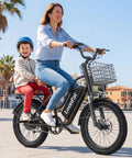 Two Seater Fat Tire Ebike With Front Basket And Rear Seat, 1000W Peak Power, 48V 13Ah Battery, City Commute Electric Bike With Front Fork Shock Absorption, Dual Disc Brakes, 20x3 Fat Tires, UL2849 Black ridden by a woman with a child on a sunny day.