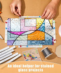 Premium 10 Piece Six Inch L Shaped Layout Block System For Stained Glass Panels With Assorted Colored Push Pins To Nail Your Designs And Keep Everything Squared Away in use for a stained glass project.