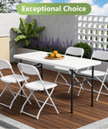 Heavy Duty 4ft Folding Table With Steel Legs, a real workhorse that handles up to 400 lbs, set for outdoor dining with chairs.