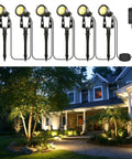 Outdoor Landscape Lighting Kit Six Pack With Transformer Plug In LED Spot Lights For Garden Yard Lawn Trees House Flags IP65 Waterproof Warm White Safe Low Voltage Setup No Fuss Install, illuminating a garden pathway.
