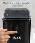 Igloo black countertop ice maker with a clear lid; front control panel shows power, ice full, and add water indicators.