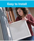 Person installing a 16x20x1 Air Filter MPR 1200D MERV 11 Allergen Reduction Plus Dust, 4-Pack Pleated HVAC Filter For Furnace And AC
