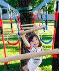 Child playing on 2 Pack Monkey Bars For Backyard Playset With Ninja Slackline Attachments For Slackline Obstacle Course And Home Playground Equipment Sets Durable Weatherproof Build For Year Round Outdoor Fun Kid Approved in backyard.