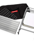 Portable Grill Table With Tons Of Prep Space For Camping, Tailgating, Picnics, And Boating, shown with foldable frame and carry bag