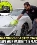 Man using Chenille Premium Scratch-Free Microfiber Wash Mitt For Your Ride Car Cleaning Lime Green Ultra-Soft Glove on white car.