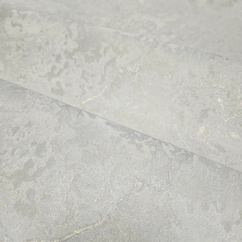 Ivory And Off White Rose Gold Cracked Faux Concrete Plaster Textured Wallpaper Rolls showing matte surface detail for DIY room decor.