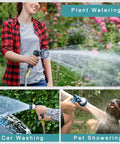 Person using Stainless Steel Garden Hose 100ft With Ten-Mode Spray Nozzle No-Kink Lightweight for plant watering, car washing, pet showering
