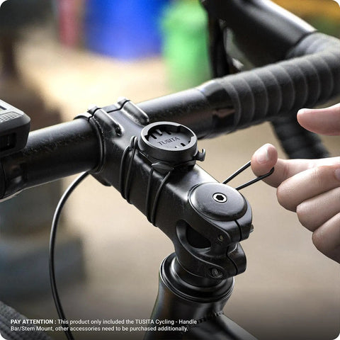 Two Pack Stem Mount For Wahoo ELEMNT Bike Computers Fits ROAM BOLT MINI And More Includes Eight Elastic Straps Four Large Four Small For Secure Fit On Stem Or Handlebar Easy View Mounting For Safer Ride being installed on bike stem.