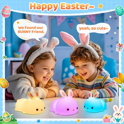 Children smiling with Kawaii Squishy Bunny Night Light For Kids With 16 Colors LED Glow Soft Silicone Bunny Lamps in Easter setting.
