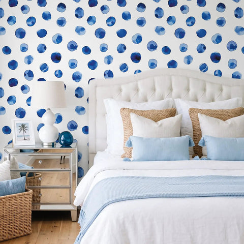 Super Sleek Blue And White Polka Dot Peel And Stick Wallpaper For Kids Rooms And Nurseries Zero Mess Peel And Apply Removable Self Adhesive Vinyl Watercolor Accent Wall Decor Refresh used on a bedroom wall behind a bed.