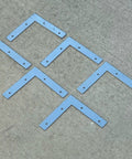 5 Inch Hot Dipped Galvanized Steel L Bracket Corner Brace Heavy Duty 90 Degree Mending Plate arranged on a flat surface.