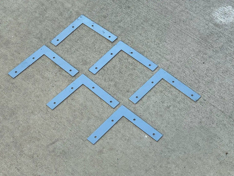 5 Inch Hot Dipped Galvanized Steel L Bracket Corner Brace Heavy Duty 90 Degree Mending Plate arranged on a flat surface.