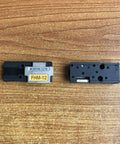 FHM-12 Fiber Holder Sheath Clamp Chucking Fixture Jigs For Ribbon Splicer Type-66M12 on wooden surface, shown front view