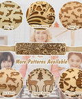 Various wooden engraved rolling pins with cat, floral, dog, heart, reindeer, and snowman patterns, displayed in a baking setting.