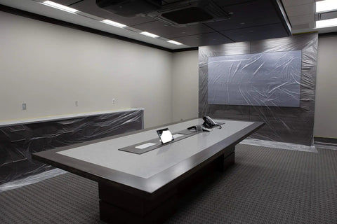Pre Taped Masking Film With Three Quarters Inch Tape For Auto Body Protection covering office walls in a conference room