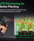 VPD Thermometer For Plants Handheld Environmental Monitor With Rapid Five Second Readings Tracks Leaf And Air Temperature Humidity And Vapor Pressure Deficit For Indoor Grow Rooms Home Gardeners And HVAC Techs handheld black digital meter measuring a grow tent