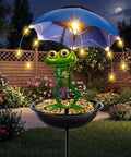 Totally Solar Frog Bird Feeder With Umbrella Garden Solar Powered Lights for yard decor in a colorful garden setting.
