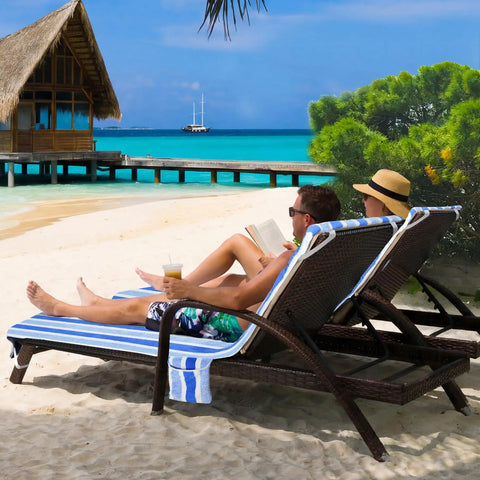 Two lounge chairs on beach with Ultra Plush Micro Fleece Lounge Chair Towel Cover Set Of 2 With Quick Dry Non Slip Backing.
