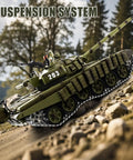 One Sixteenth RC Tank T 72 Soviet Battle Ready Toy with smoke, lights, upgraded metal tracks on rocky outdoor terrain.