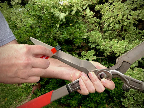 Handheld Garden Tool Sharpener With Tungsten Carbide Blade For Pruning Shears, Loppers, Hedge Clippers, And More in use on clippers