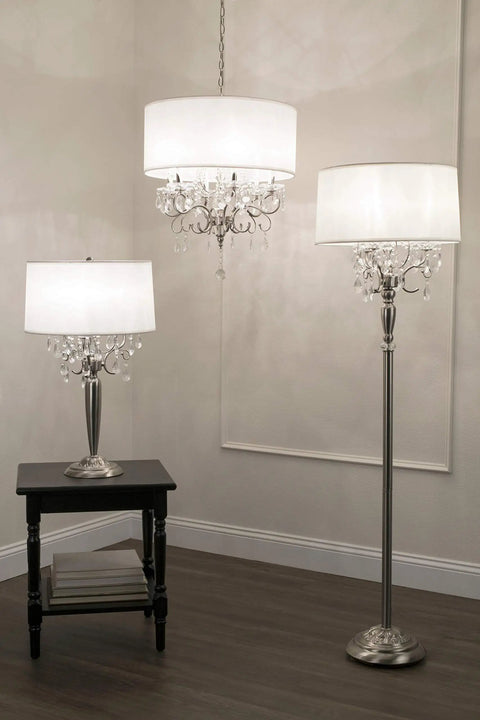Crystal Silver Table Lamp With E12 Socket And On Off Switch UL Listed 16 By 16 By 30 Inches Max 40 Watt Bulb Modern Decorative Accent Light For Living Room Bedroom Nightstand Lit Chic Glow, shown on a black table beside a standing lamp and chandelier in a modern room setting.