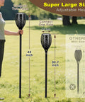 Person holding 4 Pack 96 LED Solar Tiki Torches With Flickering Flame 43 Inch Tall Outdoor Lights Waterproof for garden or yard